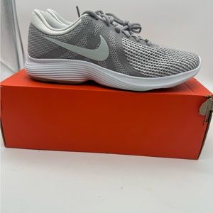 Nike woman’s Revolution 4 running shoe size 10 deadstock atmosphere grey